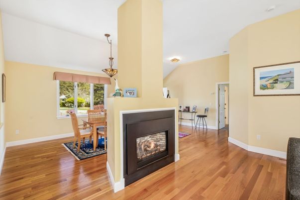 Dining room, Fireplace, Interior, Pendant Lights, Wood Texture Flooring