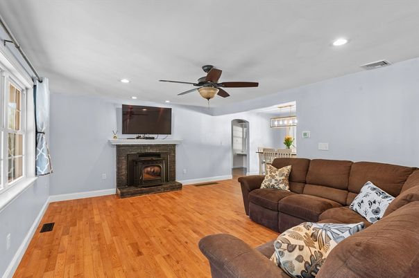 Chandelier, Fireplace, Interior, Living room, Recessed Lighting, Wood Texture Flooring