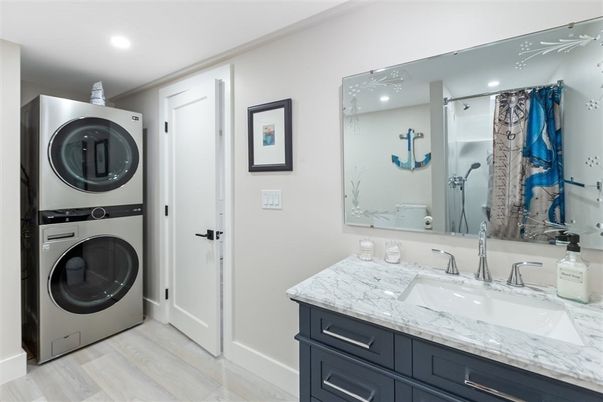 Bathroom, Interior, Recessed Lighting, Utility Closets, Washer, Wood Texture Flooring
