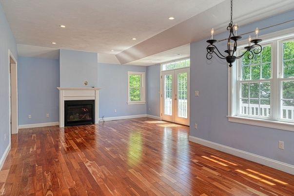 Chandelier, Empty room, Fireplace, Interior, Recessed Lighting, Wood Texture Flooring