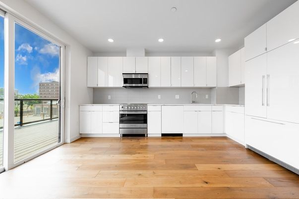 Interior, Kitchen, Recessed Lighting, Stainless Steel Appliances, Wood Texture Flooring