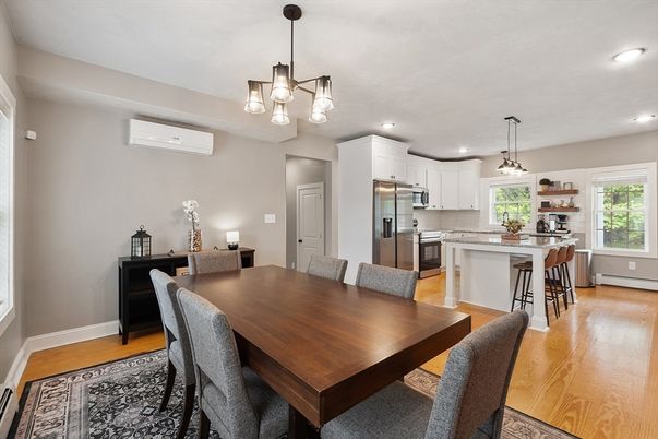 Dining room, Interior, Kitchen, Pendant Lights, Recessed Lighting, Stainless Steel Appliances, Wood Texture Flooring