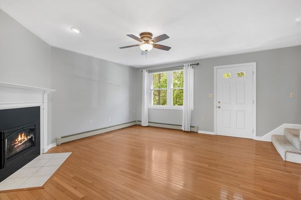 Empty room, Fireplace, Interior, Recessed Lighting, Wood Texture Flooring
