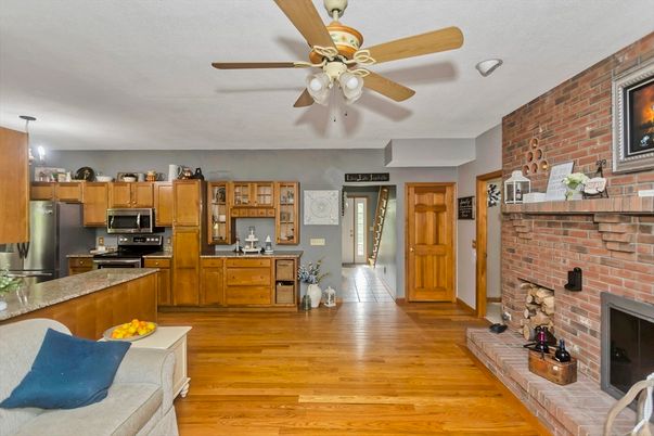 Interior, Kitchen, Pendant Lights, Stainless Steel Appliances, Stone Walls, Wood Texture Flooring