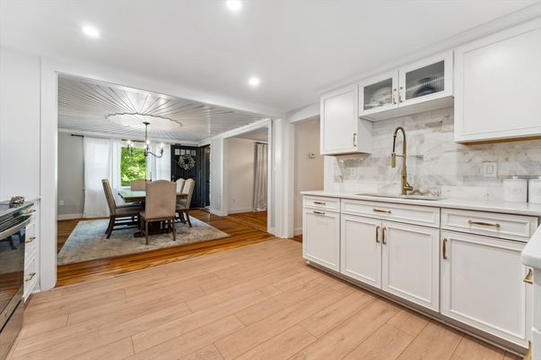Dining room, Interior, Kitchen, Marble Walls, Pendant Lights, Recessed Lighting, Wood Texture Flooring