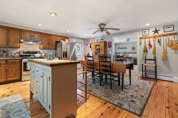 Dining room, Interior, Kitchen, Recessed Lighting, Stainless Steel Appliances, Wood Texture Flooring