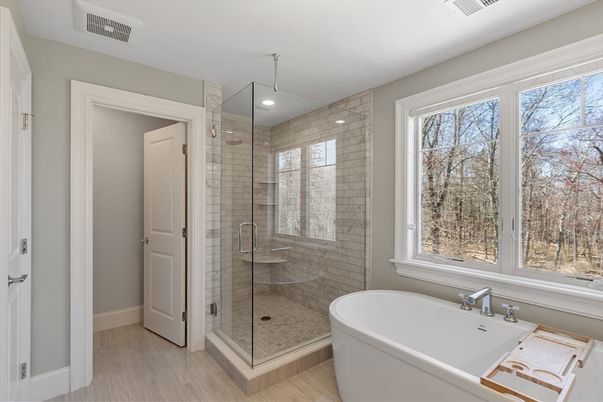 Bathroom, Free Standing Baths, Glass Shower, Interior, Recessed Lighting, Wood Texture Flooring