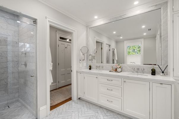 Bathroom, Dual Sink Vanities, Glass Shower, Interior, Marble, Marble Walls, Recessed Lighting