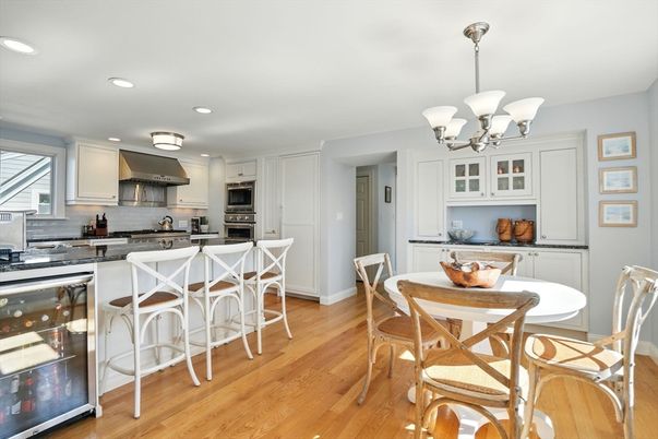 Chandelier, Dining room, Interior, Kitchen, Recessed Lighting, Stainless Steel Appliances, Wood Texture Flooring