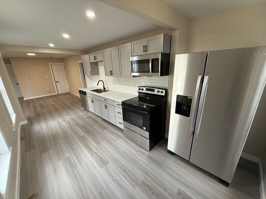 Interior, Kitchen, Recessed Lighting, Stainless Steel Appliances, Wood Texture Flooring