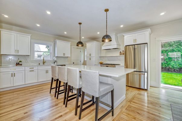 Interior, Kitchen, Marble Walls, Pendant Lights, Recessed Lighting, Stainless Steel Appliances, Wood Texture Flooring