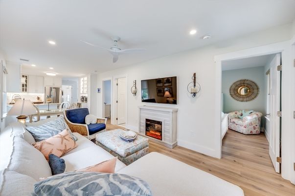 Fireplace, Interior, Kitchen, Living room, Recessed Lighting, Stainless Steel Appliances, Wood Texture Flooring
