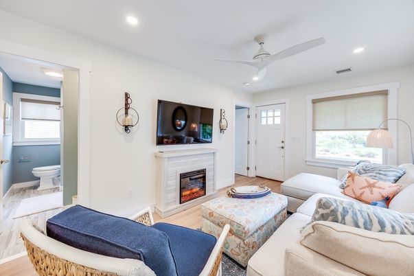 Bathroom, Fireplace, Interior, Living room, Recessed Lighting, Wood Texture Flooring