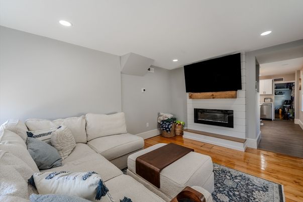 Fireplace, Interior, Kitchen, Living room, Recessed Lighting, Stainless Steel Appliances, Wood Texture Flooring
