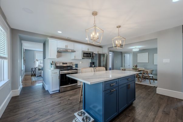 Dining room, Interior, Kitchen, Pendant Lights, Recessed Lighting, Stainless Steel Appliances, Wood Texture Flooring