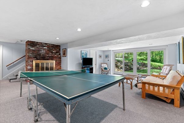 Fireplace, Game Room, Interior, Recessed Lighting, Stone Walls
