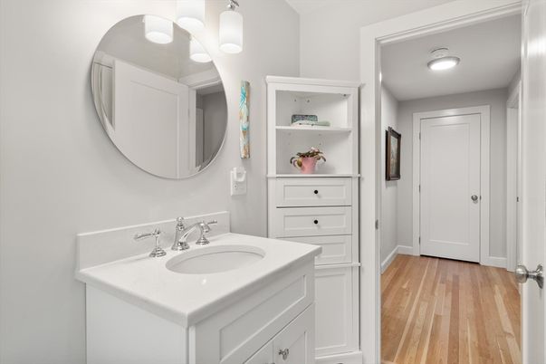 Bathroom, Dual Sink Vanities, Interior, Recessed Lighting, Wood Texture Flooring