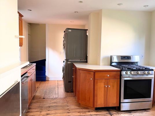 Interior, Kitchen, Recessed Lighting, Stainless Steel Appliances, Washer, Wood Texture Flooring