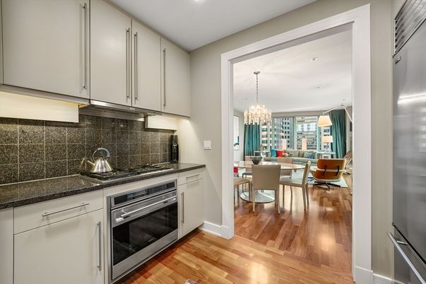 Chandelier, Dining room, Interior, Kitchen, Recessed Lighting, Stainless Steel Appliances, Wood Texture Flooring
