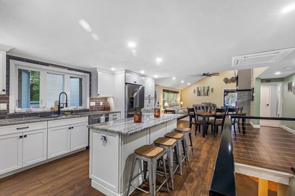 Dining room, Interior, Kitchen, Recessed Lighting, Stainless Steel Appliances, Wood Texture Flooring