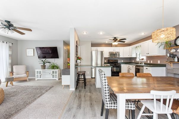 Dining room, Interior, Kitchen, Pendant Lights, Recessed Lighting, Stainless Steel Appliances, Wood Texture Flooring