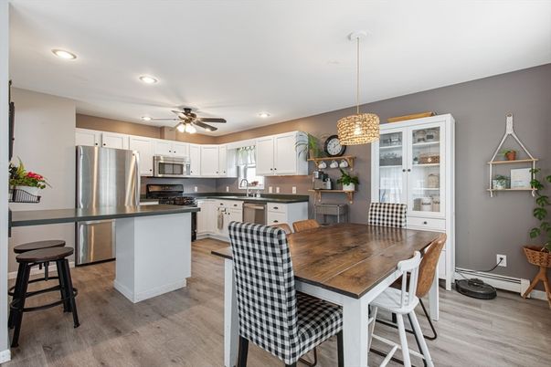 Dining room, Interior, Kitchen, Pendant Lights, Recessed Lighting, Stainless Steel Appliances, Wood Texture Flooring