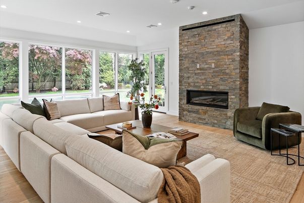 Fireplace, Interior, Living room, Recessed Lighting, Stone Walls, Wood Texture Flooring