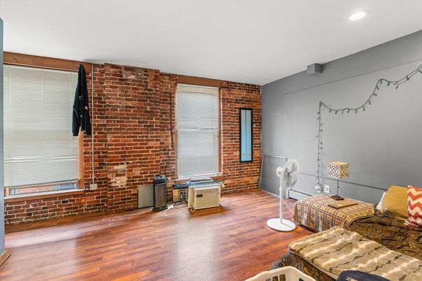 Empty room, Interior, Recessed Lighting, Stone Walls, Wood Texture Flooring