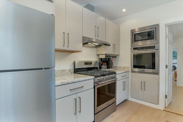 Interior, Kitchen, Recessed Lighting, Stainless Steel Appliances, Wood Texture Flooring