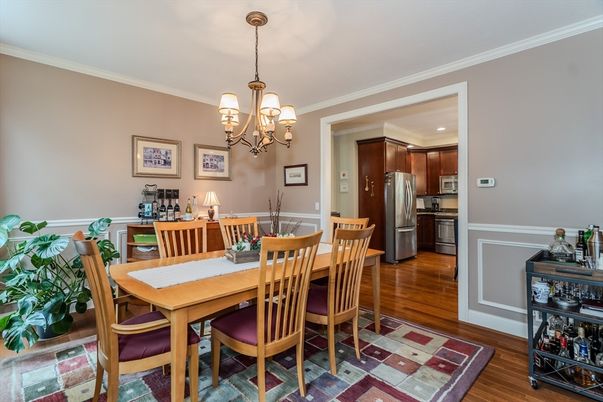 Chandelier, Dining room, Interior, Kitchen, Recessed Lighting, Stainless Steel Appliances, Wood Texture Flooring