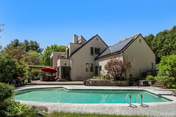 Exterior, Pool, Solar Panels