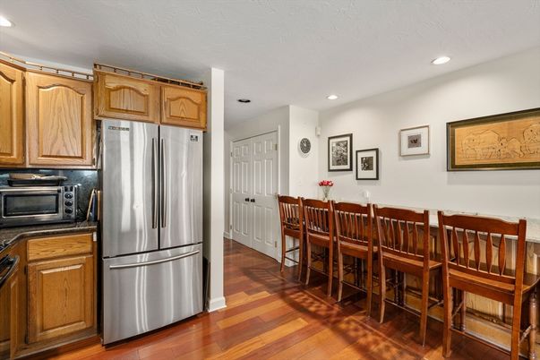 Dining room, Interior, Kitchen, Recessed Lighting, Stainless Steel Appliances, Wood Texture Flooring