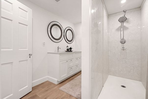 Bathroom, Interior, Marble Walls, Recessed Lighting, Wood Texture Flooring
