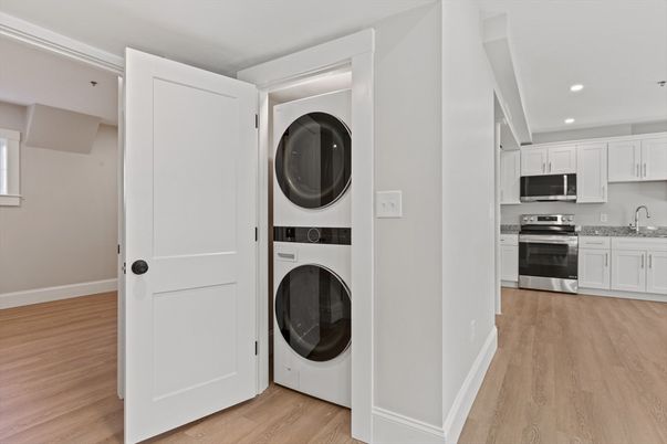 Interior, Kitchen, Recessed Lighting, Stainless Steel Appliances, Utility Closets, Washer, Wood Texture Flooring