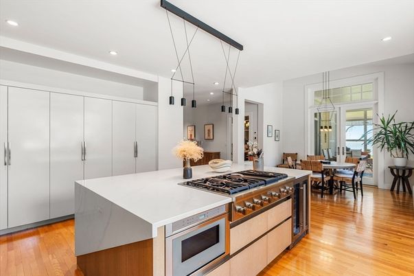 Dining room, Interior, Kitchen, Pendant Lights, Recessed Lighting, Stainless Steel Appliances, Wood Texture Flooring