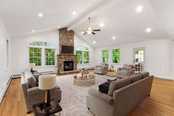 Fireplace, Interior, Living room, Recessed Lighting, Stone Walls, Wood Texture Flooring