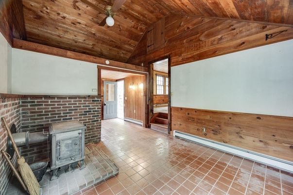 Empty room, Fireplace, Interior, Stone Walls, Wooden Ceilings, Wooden Walls