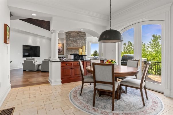 Dining room, Interior, Living room, Pendant Lights, Recessed Lighting, Stone Walls, Wood Texture Flooring