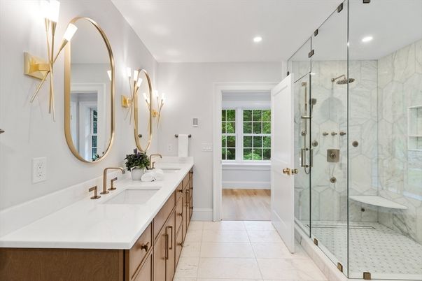 Bathroom, Dual Sink Vanities, Glass Shower, Interior, Marble, Marble Walls, Recessed Lighting, Wood Texture Flooring