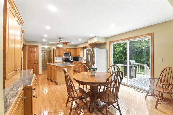Dining room, Interior, Kitchen, Recessed Lighting, Stainless Steel Appliances, Wood Texture Flooring