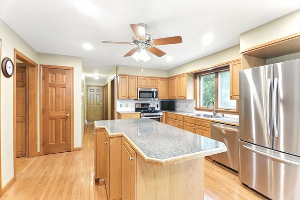 Interior, Kitchen, Recessed Lighting, Stainless Steel Appliances, Wood Texture Flooring