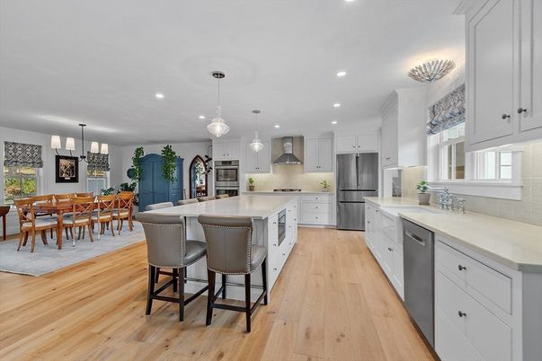 Chandelier, Dining room, Interior, Kitchen, Pendant Lights, Recessed Lighting, Stainless Steel Appliances, Wood Texture Flooring
