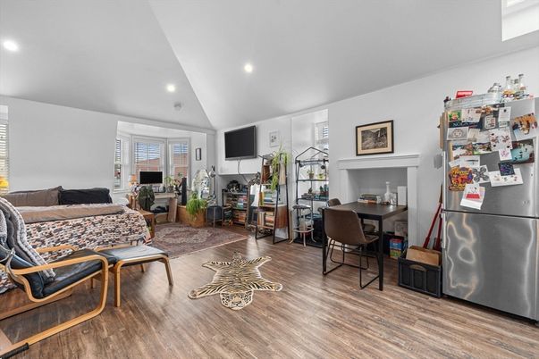 Dining room, Fireplace, Interior, Living room, Recessed Lighting, Wood Texture Flooring