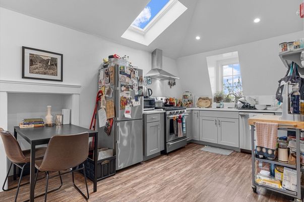 Dining room, Interior, Kitchen, Recessed Lighting, Stainless Steel Appliances, Wood Texture Flooring