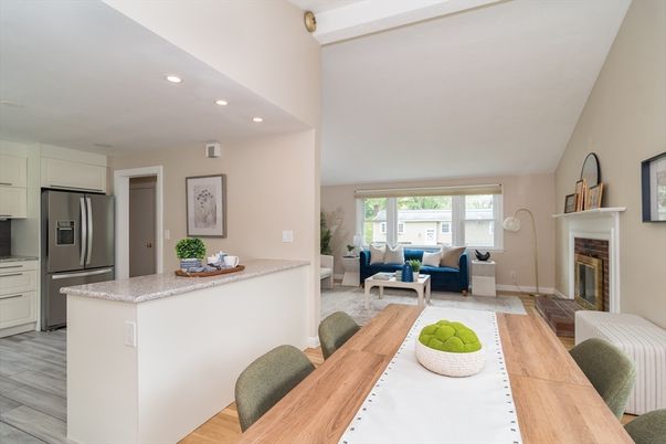 Dining room, Fireplace, Interior, Kitchen, Living room, Recessed Lighting, Stainless Steel Appliances, Wood Texture Flooring