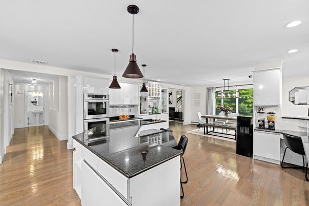 Dining room, Interior, Kitchen, Pendant Lights, Recessed Lighting, Stainless Steel Appliances, Wood Texture Flooring