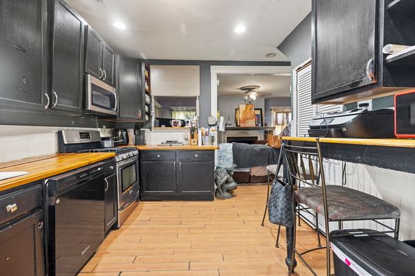 Fireplace, Interior, Kitchen, Recessed Lighting, Wood Texture Flooring