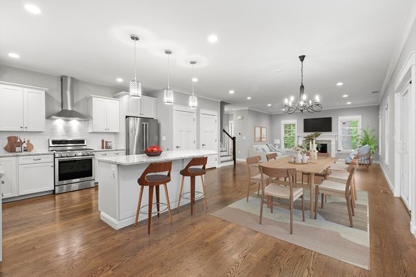 Chandelier, Dining room, Fireplace, Interior, Kitchen, Pendant Lights, Recessed Lighting, Stainless Steel Appliances, Wood Texture Flooring