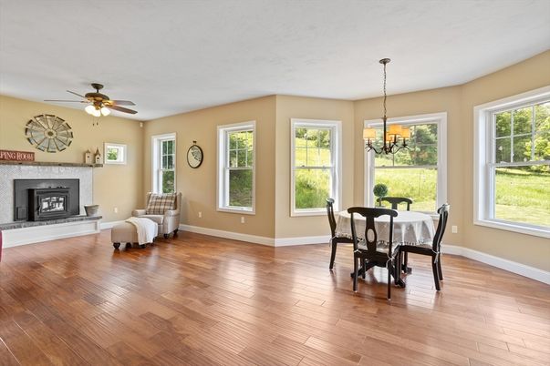 Dining room, Fireplace, Interior, Pendant Lights, Wood Texture Flooring