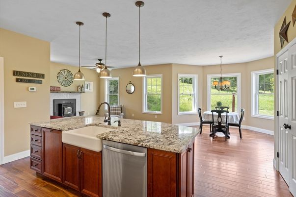 Dining room, Fireplace, Interior, Kitchen, Pendant Lights, Wood Texture Flooring